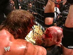 Goldberg Is Beaten To Death By Triple H